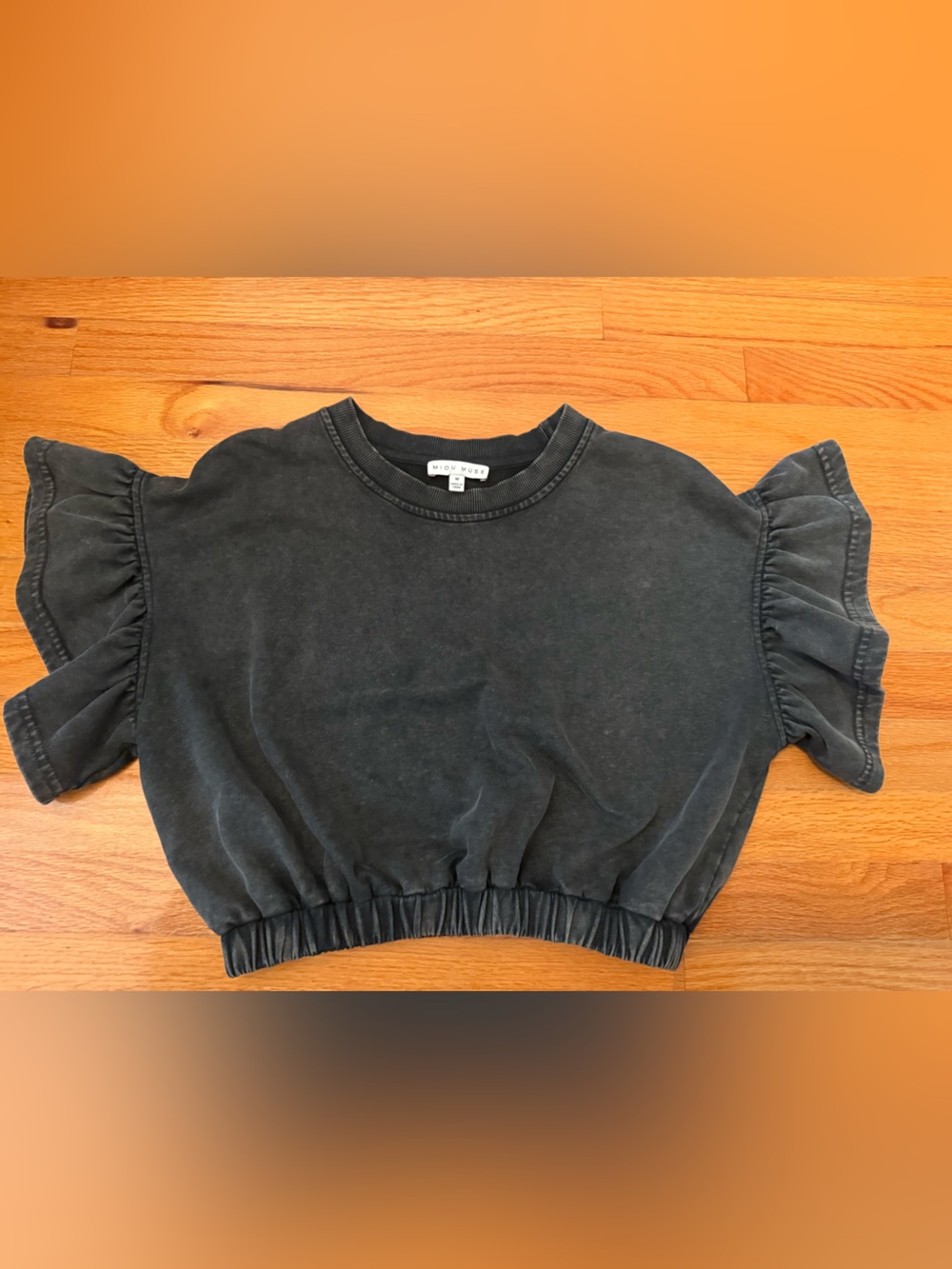 Washed Black Cropped Ruffle Sleeve Tee by Miou Muse